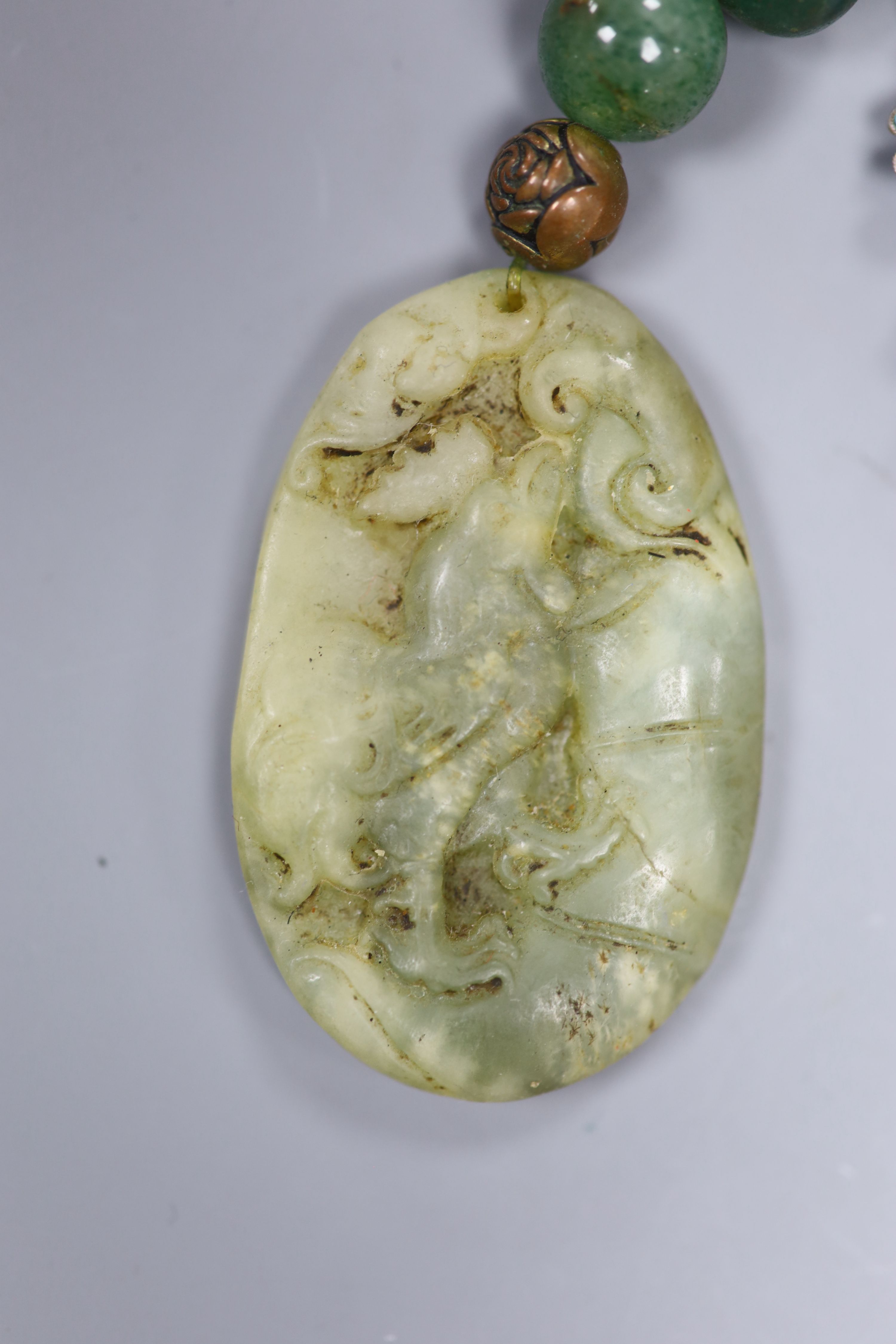 A Chinese jade necklace and jewellery